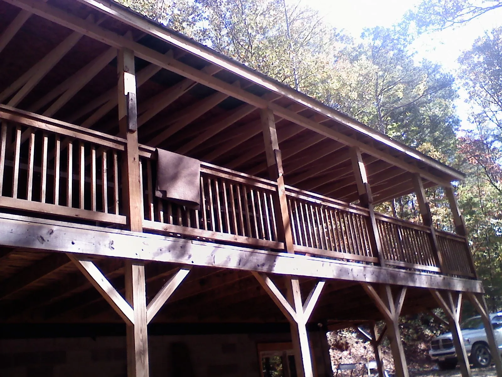 Timber framing under a new elevated porch and deck — Roof Leak Repair in Meigs by Roofing Brothers